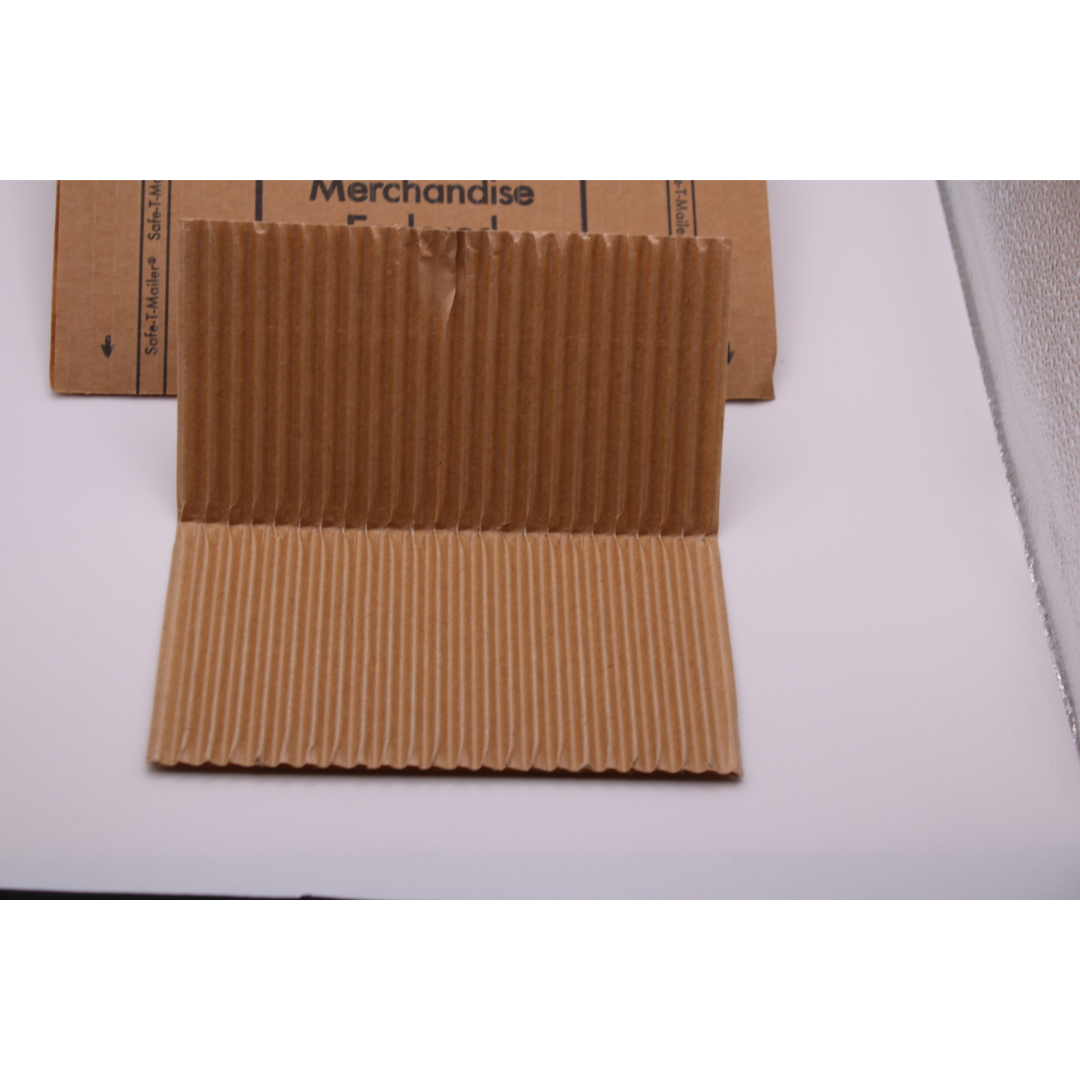 Safe-T-Mailer Cardboard shipping protector. Self seal.