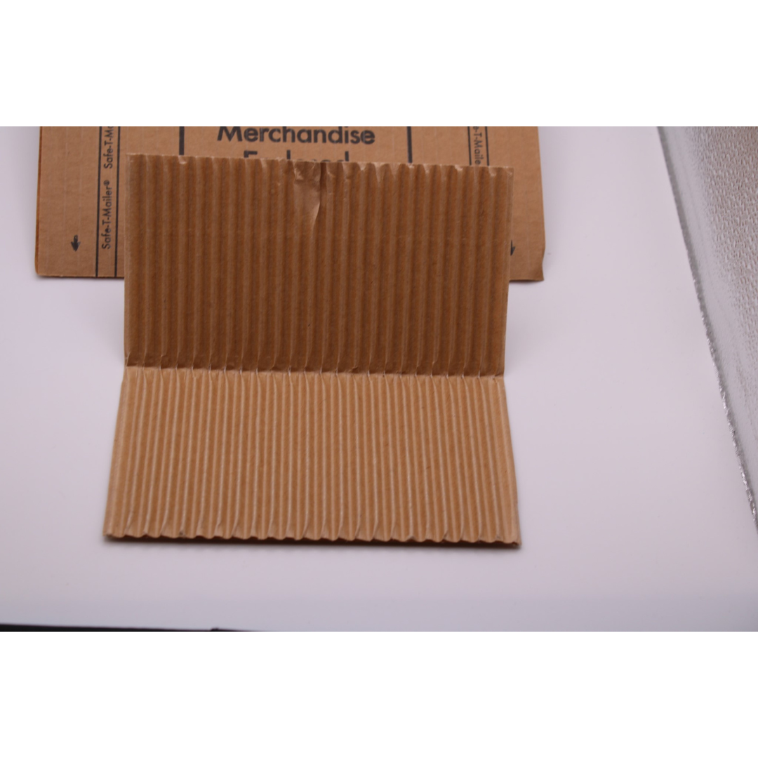 Safe-T-Mailer Cardboard shipping protector.  Self seal.