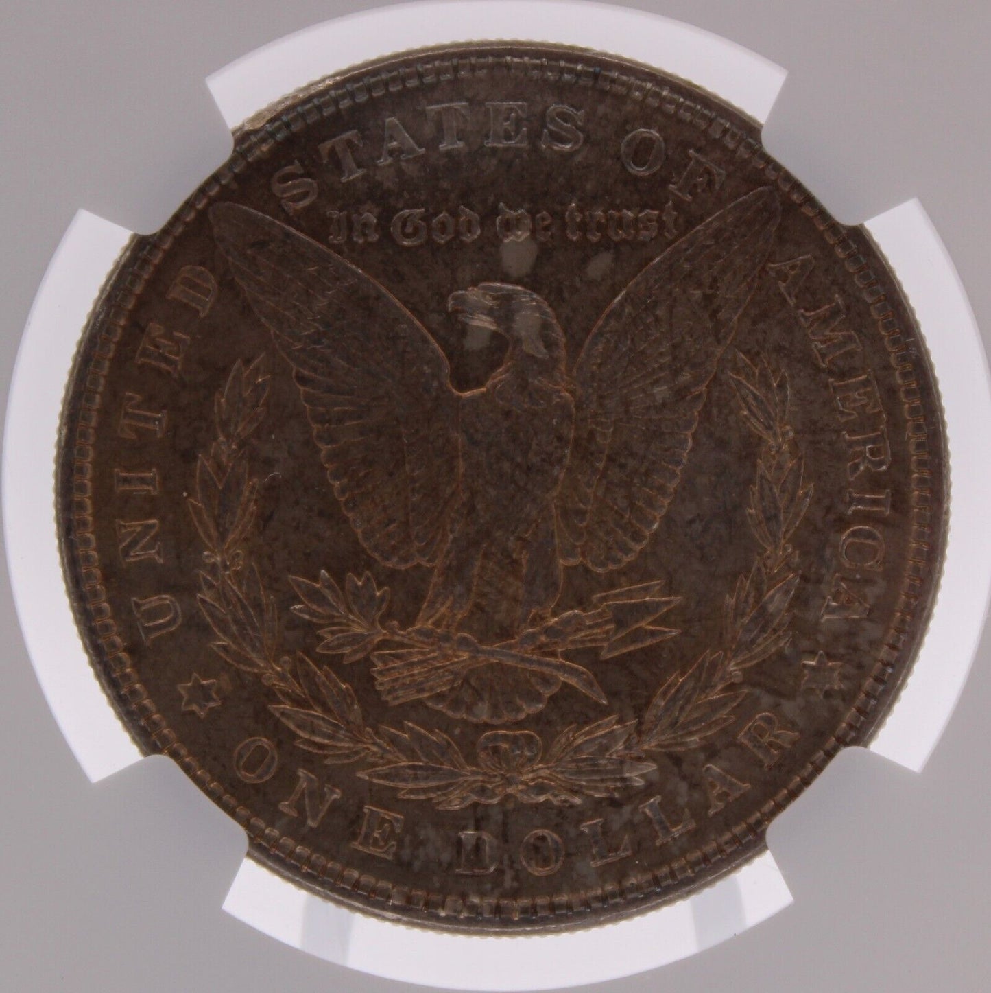 1885 P Morgan Dollar NGC MS-65 CAC reverse is toned